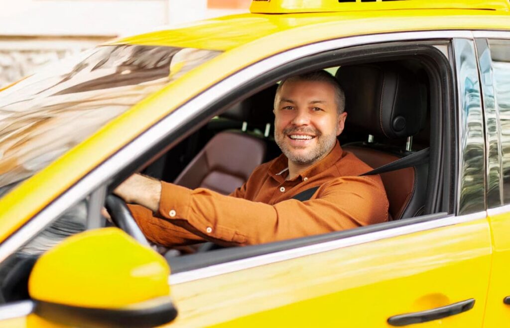 Taxista ciente das regras de isenção que sabe como consultar o valor do IPVA 2026 de sua categoria.